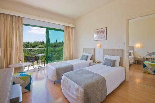 Natura Beach Hotel And Villas
