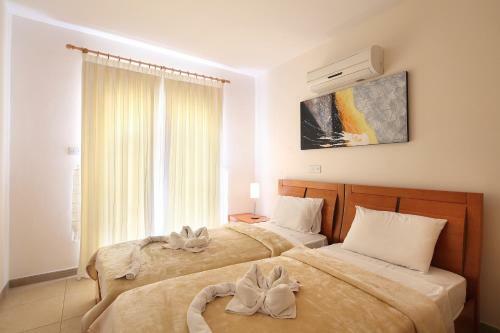Apartamento Adamou Gardens