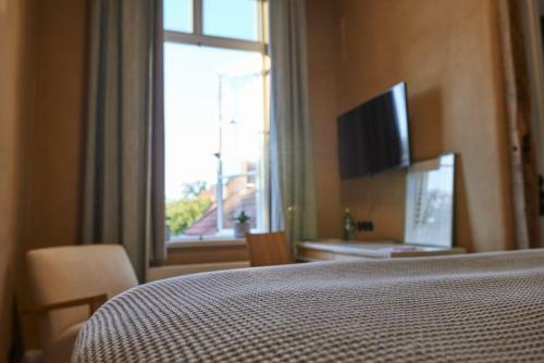 Alte Apotheke Hotel Und Cafe