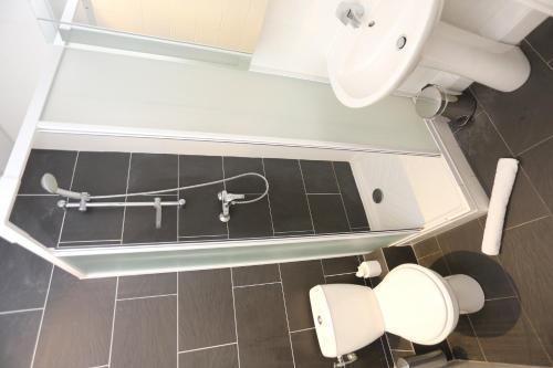 Apartamento O'sullivans Bar And Hotel