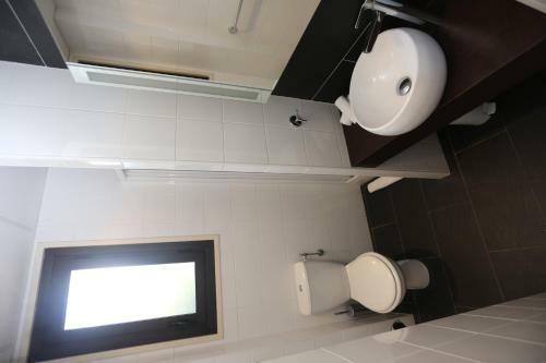 Apartamento O'sullivans Bar And Hotel