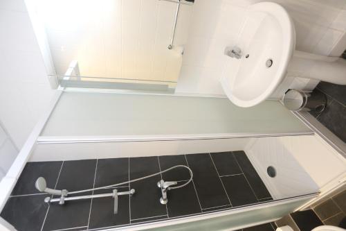 Apartamento O'sullivans Bar And Hotel