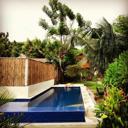 Hostal Cotton Tree Cottages
