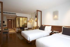 Hotel Woodlands Suites