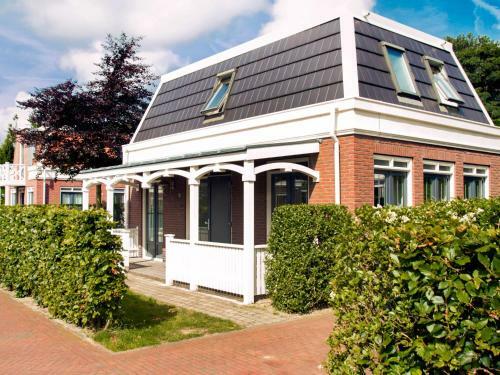 Villa Holiday Home Bungalowparck Tulp & Zee.10