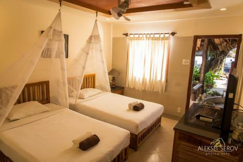 Hotel Joe's Cafe & Garden Resort