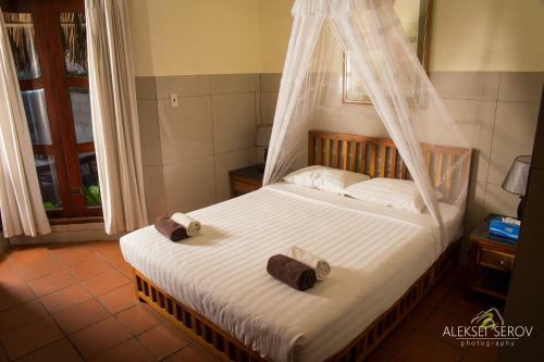 Hotel Joe's Cafe & Garden Resort