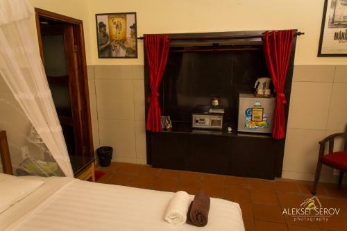 Hotel Joe's Cafe & Garden Resort