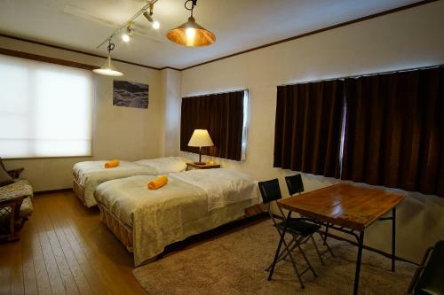 Hostal Hakuba Station Guesthouse En