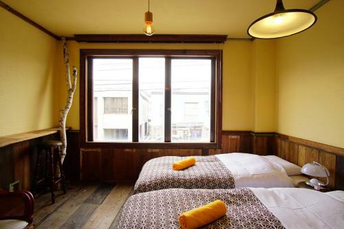 Hostal Hakuba Station Guesthouse En