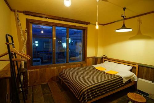 Hostal Hakuba Station Guesthouse En