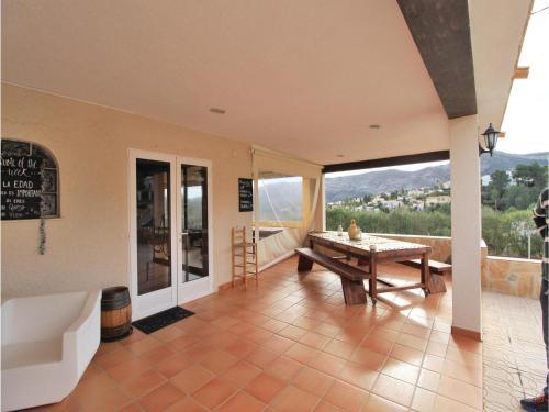 Four-bedroom Holiday Home In Benidoleig