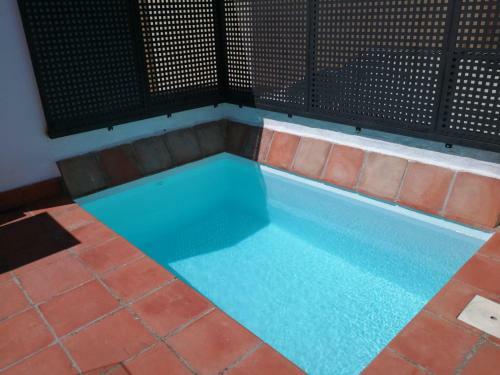 Reservaloen Casa Sevillana