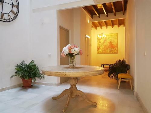 Reservaloen Casa Sevillana