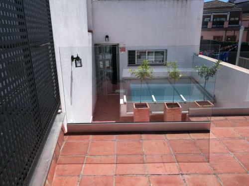 Reservaloen Casa Sevillana