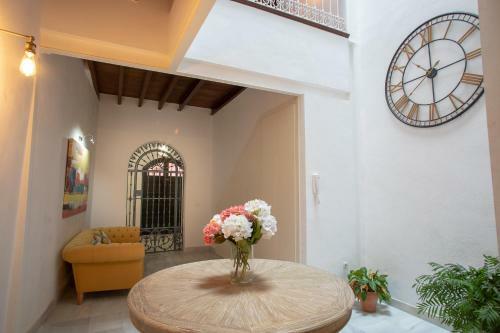 Reservaloen Casa Sevillana