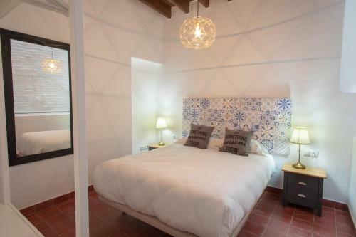Reservaloen Casa Sevillana