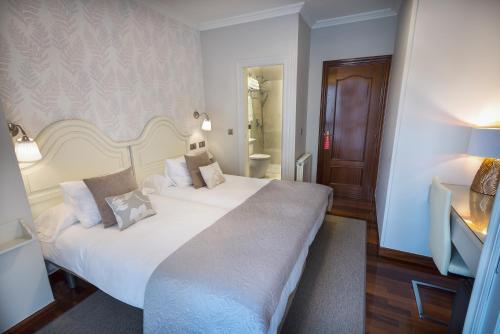 Hostal Cuatro Caminos Rooms