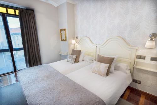 Hostal Cuatro Caminos Rooms