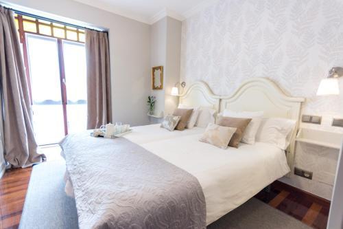 Hostal Cuatro Caminos Rooms
