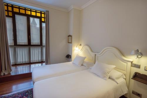 Hostal Cuatro Caminos Rooms