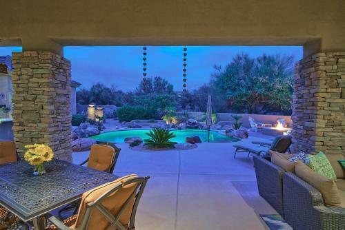 Oasis In The Desert Near Boulders