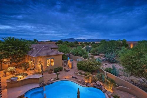 Oasis In The Desert Near Boulders