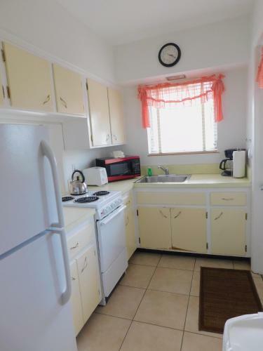 Apartamento The Grove Beach Condominiums