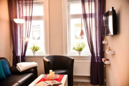 Apartamentos Ferienwohnung Schwarz & Wei�