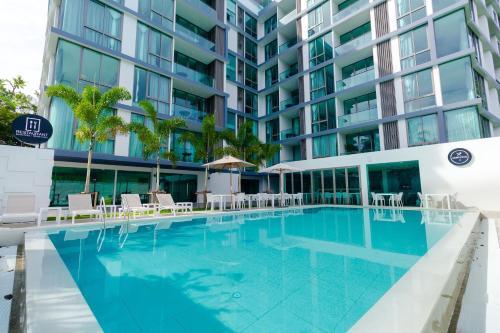 Apartamentos Ocean Stone Phuket By Holy Cow 10