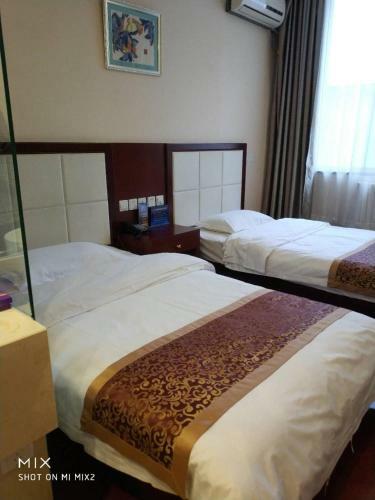 Beijing Gongmei Blue Peacock Business Hotel