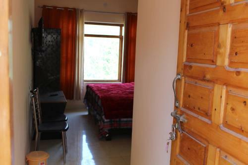 Hostal The Dhanolti Groove Garden