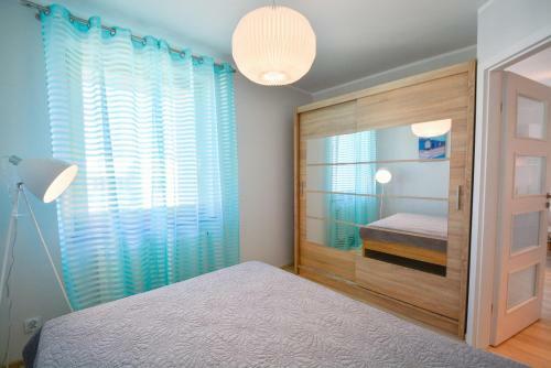 Apartamenty Bryza - Kwarta? R�?y Wiatr�w