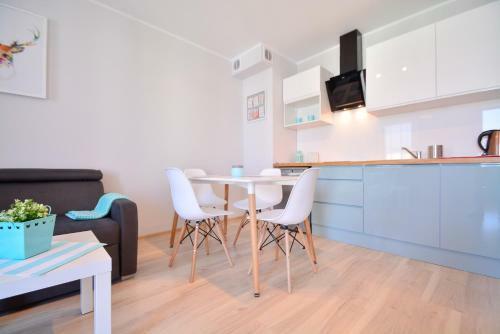 Apartamenty Bryza - Kwarta? R�?y Wiatr�w