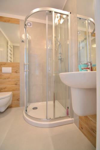 Apartamenty Bryza - Kwarta? R�?y Wiatr�w