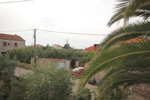 Apartments By The Sea Ugljan - 8301