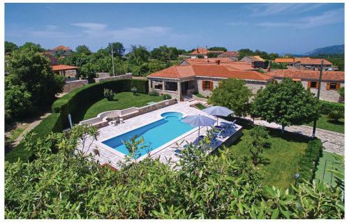 Four-bedroom Holiday Home In Vitaljina