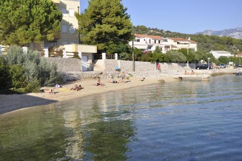 Apartments With A Parking Space Barbat (rab) - 12871