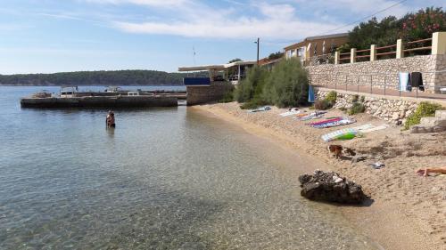 Apartments With A Parking Space Barbat (rab) - 12871