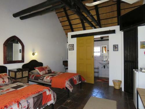 Hostal Lion's Den Guesthouse