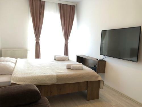 Hostal White Roof Apartments