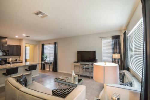 Glamorous 4 Bedroom 3.5 Bath End Unit Town Home Located In Compass Bay