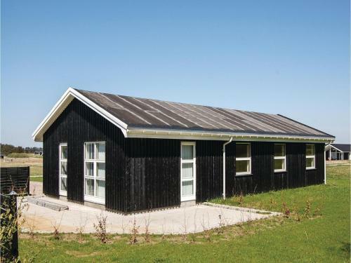 Four-bedroom Holiday Home In Lokken