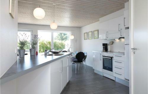 Four-bedroom Holiday Home In Lokken