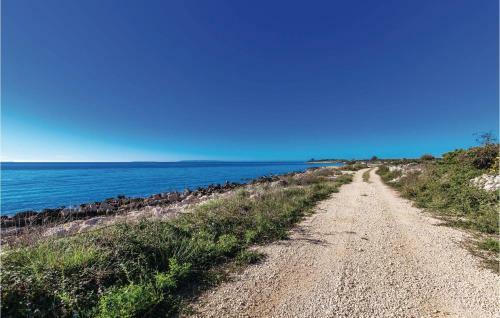 Four-bedroom Holiday Home In Novalja