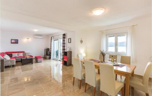 Three-bedroom Apartment In Komarna