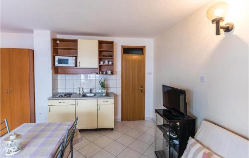 Three-bedroom Apartment In Komarna