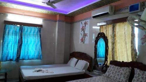 Hotel Goroomgo Sureswory Pampa Puri