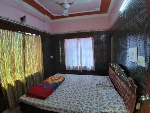 Hotel Goroomgo Sureswory Pampa Puri