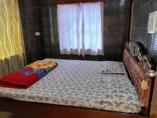 Hotel Goroomgo Sureswory Pampa Puri